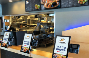 digital menu board in restaurant, interactive ordering kiosk, modern QSR technology